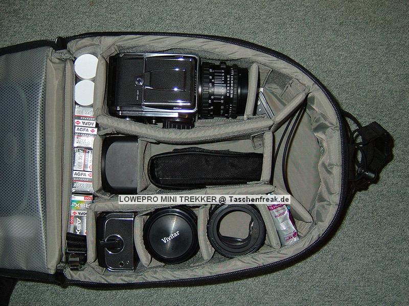 LOWEPRO MINI TREKKER\n\nFoto von einem sehr netten Fotokollegen der namentlich nicht genannt werden mchte - VIELEN DANK DIR!\n\nKommentar des Nutzers:\n\nTasche: LowePro MiniTrekker 2000 (das neuere Modell, aber kein AW)\n\nInhalt: Hasselblad mit 80er-Optik und Magazin, Geli, Beli, 2x-Konverter, Zweitmagazin, Zwischenringe, Filme usw.