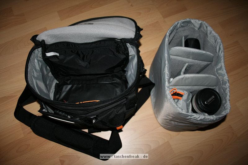 Lowepro Stealth Reporter D400 AW\n\nFoto von Jens Krmer - VIELEN DANK!\n\nKommentar des Nutzers:\n\nIn der Tasche selber sind Blitz Canon 430EX, Canon 70-200mm 2,8, Canon 60mm Macro. Die Kamera die immer drin ist, ist die EOS 350d mit BG + Objektiv (Kit oder was unten steht). Zubehrbeutel fr Blitz und Kleinkram + Speicherkartentasche. Die Tasche (orange) + Speicherkartentasche sind bei der Tasche dabei. (Lowepro Stealth Reporter D400 AW). Platz ist jetzt noch fr zwei weitere Objektiv meist das 24mm, 50mm 1,4 / 85mm 1,8. \n\nGru Jens